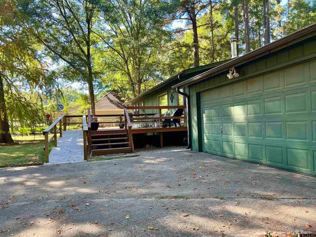 a view of a house with a back yard
