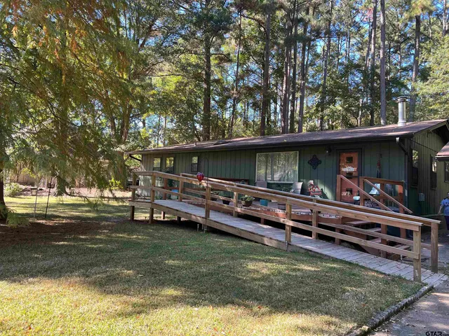 a view of swimming pool with a patio