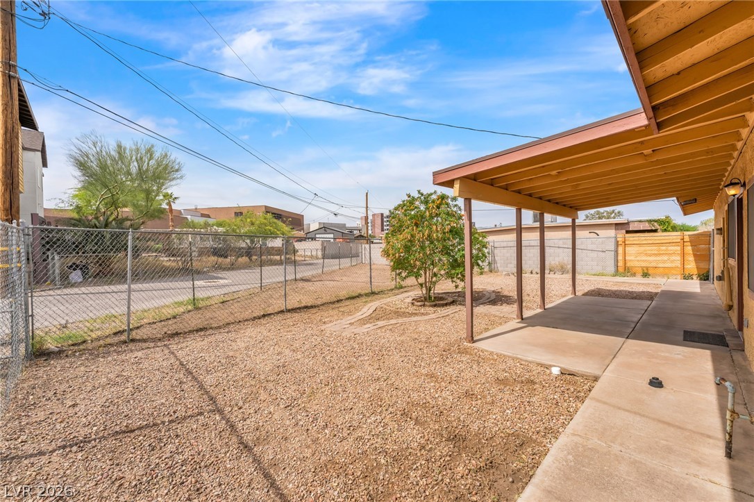 242 Nebraska Avenue Henderson, NV 89015 - Photo 28 of 46 Fenced backyard with a patio with access to alley