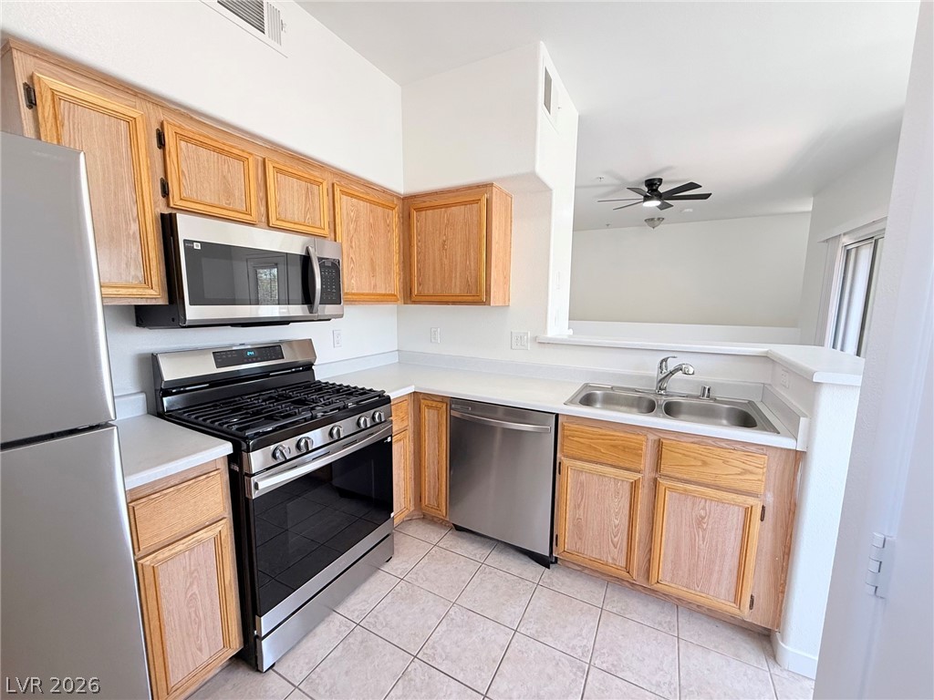 9050 West Warm Springs Road, Unit 2002 Las Vegas, NV 89148 - Photo 17 of 46 This modern kitchen features stainless steel appliances and ample counter space for daily living.