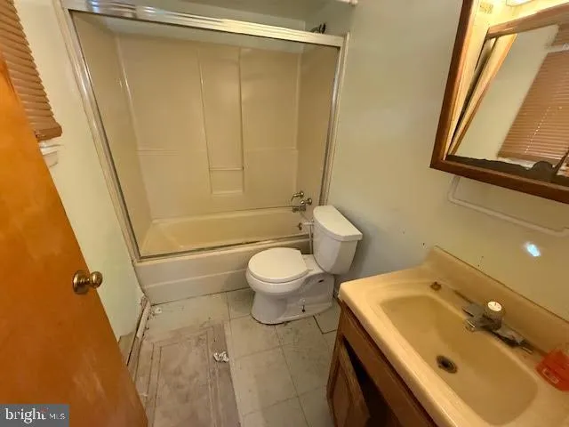 a bathroom with a sink and a toilet