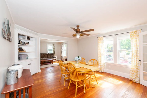 3 Spring Street Salisbury, MA 01952 - Photo 6 of 25 a dining room with furniture and wooden floor