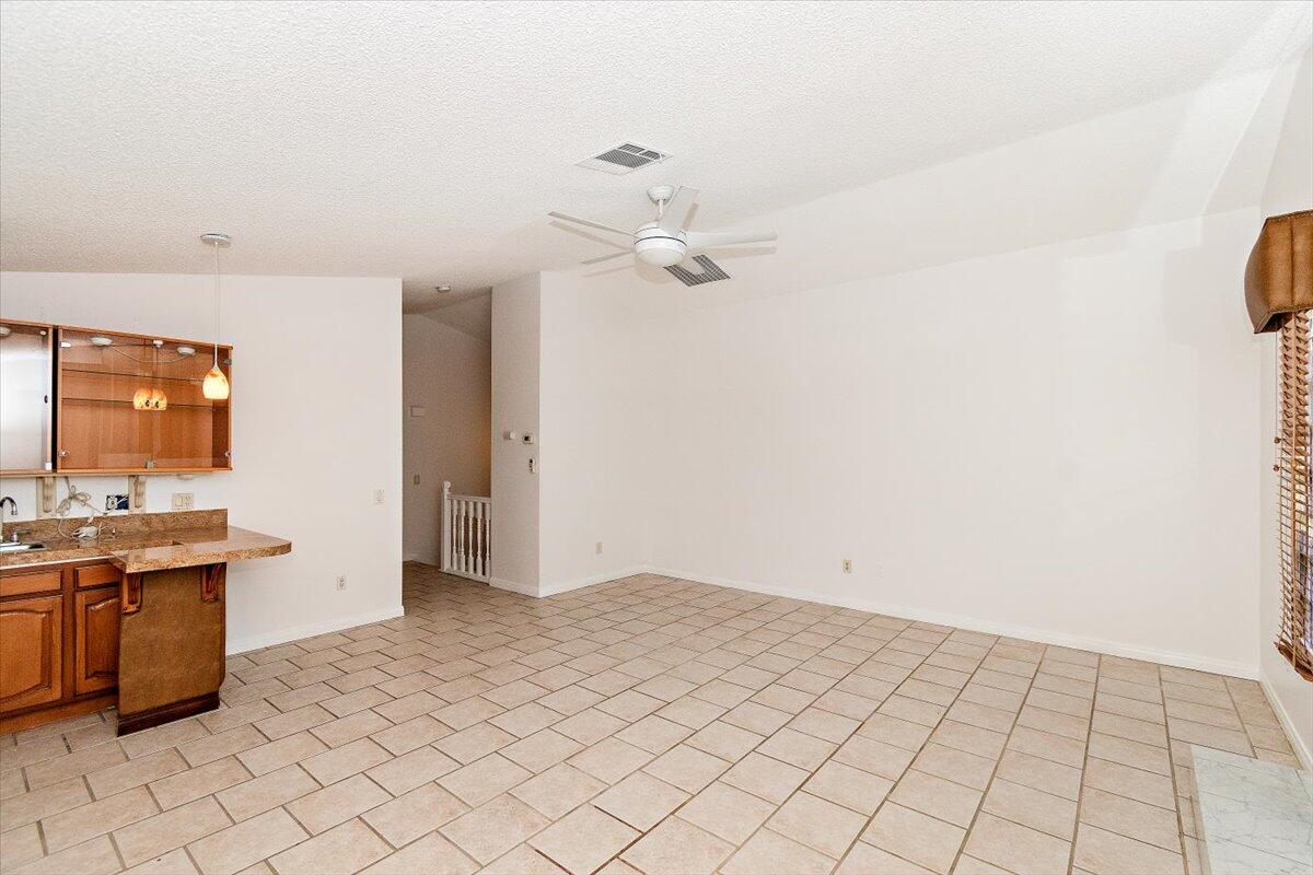 68954 Durango Road Cathedral City, CA 92234 - Photo 12 of 31 a view of a kitchen with a sink and dishwasher