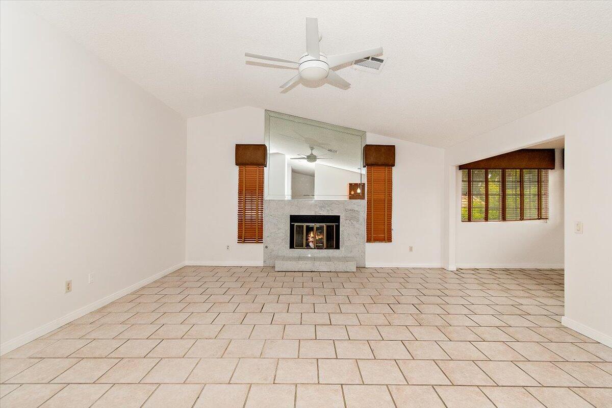 68954 Durango Road Cathedral City, CA 92234 - Photo 13 of 31 a view of an empty room with window and fireplace
