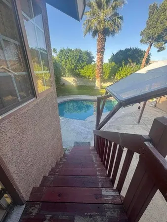 a view of a balcony with an outdoor space