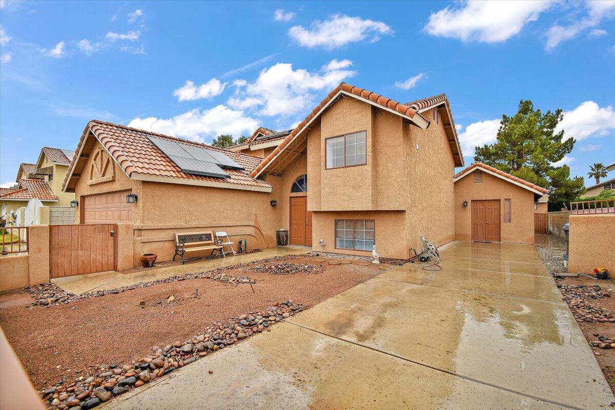 68954 Durango Road Cathedral City, CA 92234 - Photo 4 of 31 a view of a house with a yard