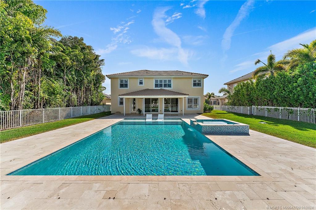 565 Southwest Yacht Basin Way Stuart, FL 34997 - Photo 41 of 55 a view of house with a swimming pool