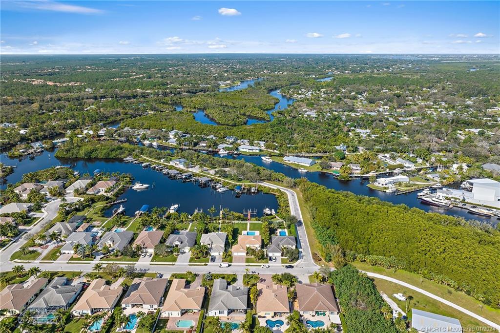 565 Southwest Yacht Basin Way Stuart, FL 34997 - Photo 51 of 55 an aerial view of residential building with outdoor space