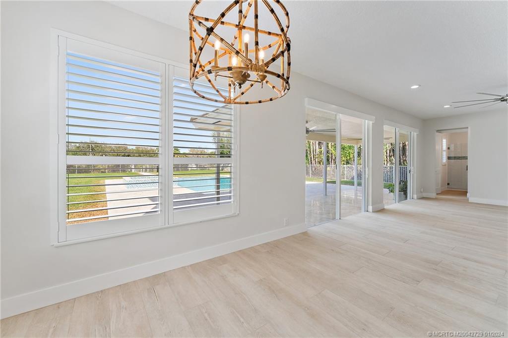 565 Southwest Yacht Basin Way Stuart, FL 34997 - Photo 10 of 55 a view of an empty room with a window