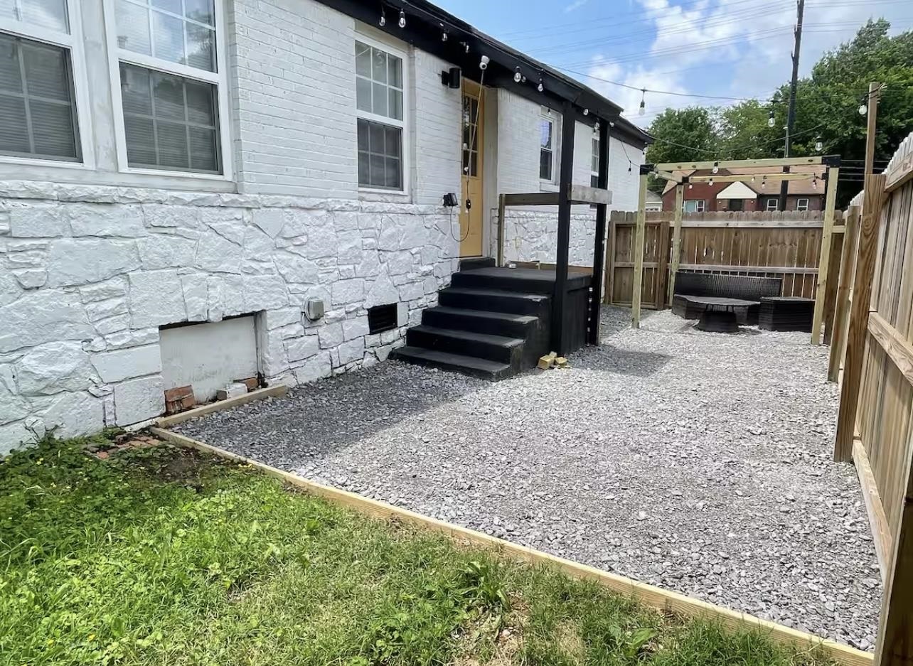 84 North Holmes Street Memphis, TN 38111 - Photo 17 of 18 Rear view of property with stone siding