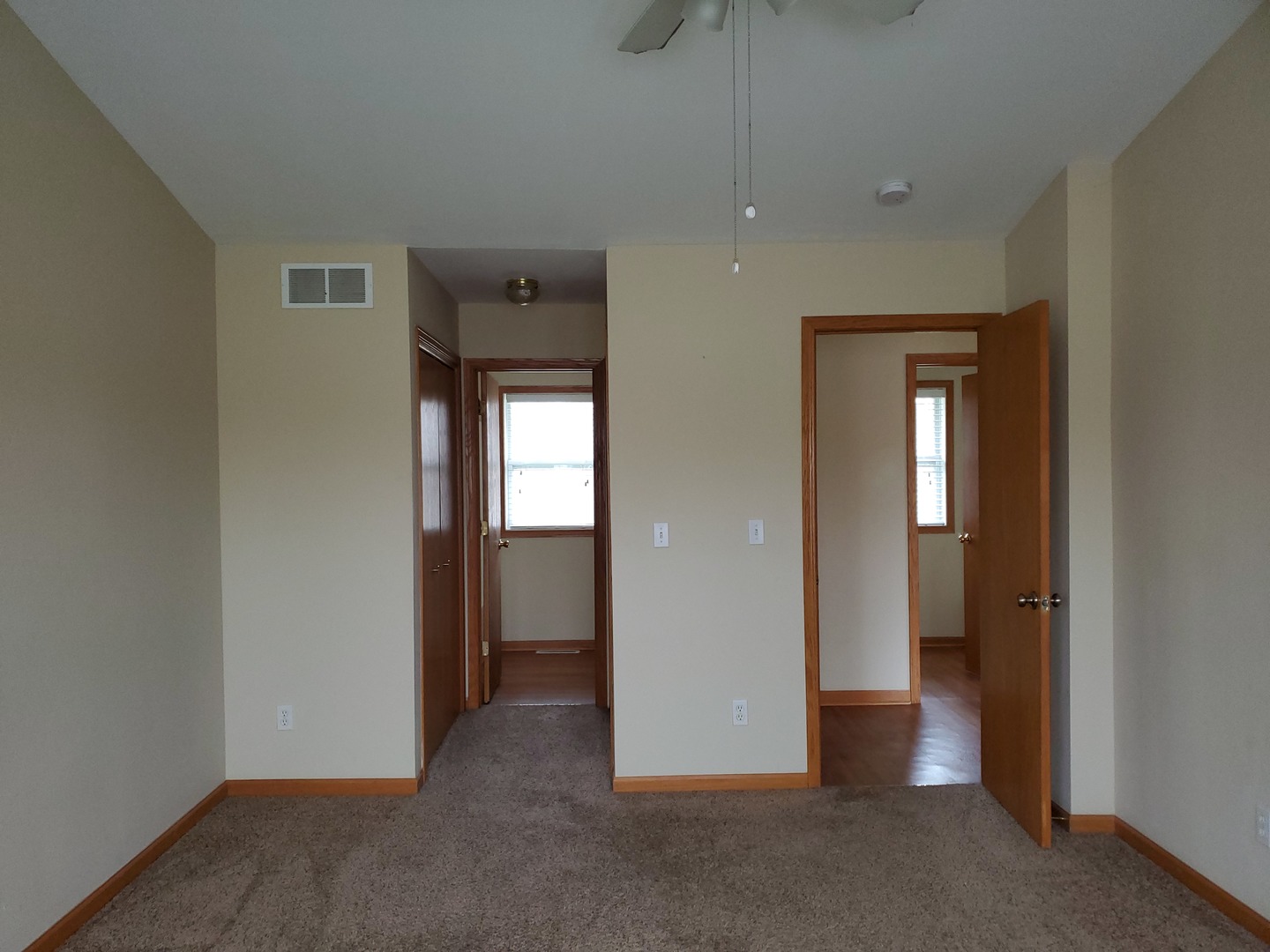 131 Lamplighter Loop Southeast Poplar Grove, IL 61065 - Photo 11 of 13 an empty room that has a mirror
