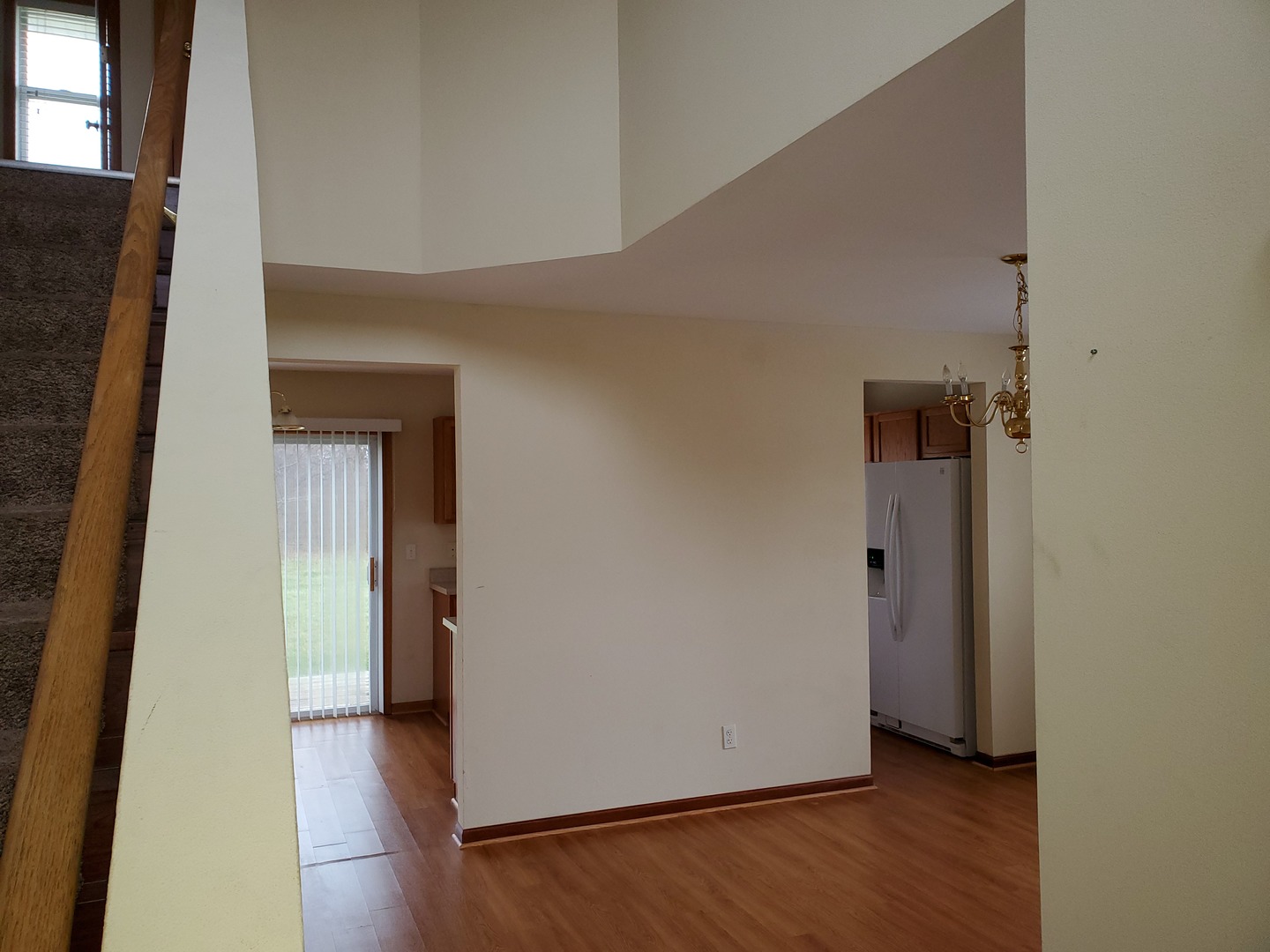 131 Lamplighter Loop Southeast Poplar Grove, IL 61065 - Photo 8 of 13 a view of a hallway with wooden floor
