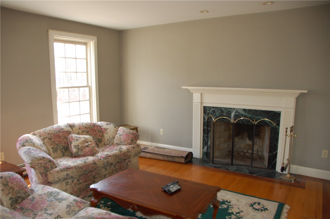 244 Klondike Road Charlestown, RI 02813 - Photo 8 of 23 Formal Living Room with Fireplace
