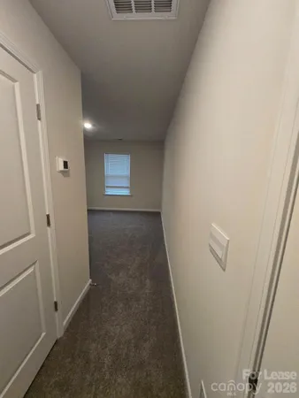 a view of hallway with window