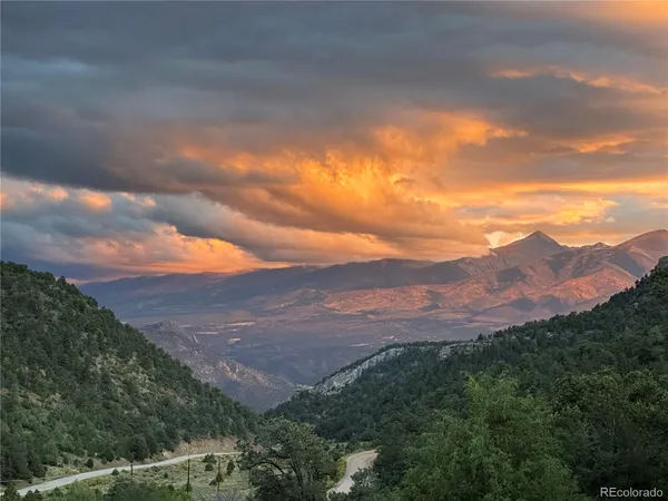 a view of a city with mountains in the background