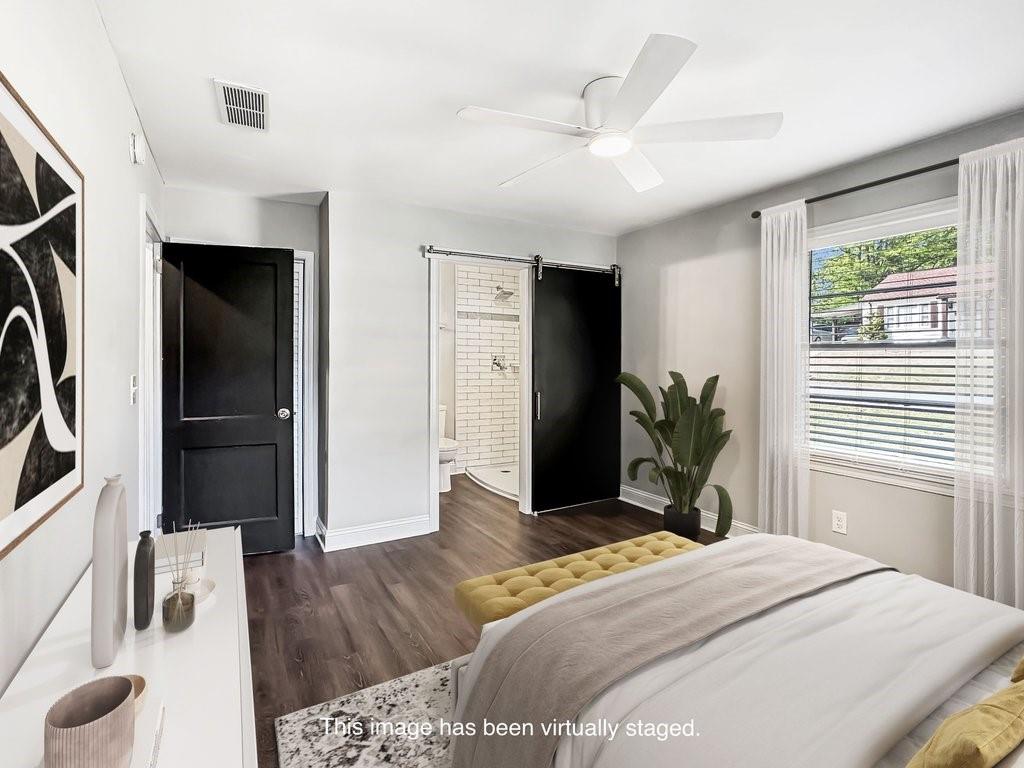 2350 Old Spring Road Smyrna, GA 30080 - Photo 14 of 26 a bedroom with a bed and a large window