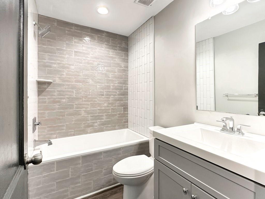 2350 Old Spring Road Smyrna, GA 30080 - Photo 19 of 26 a bathroom with a sink toilet and shower