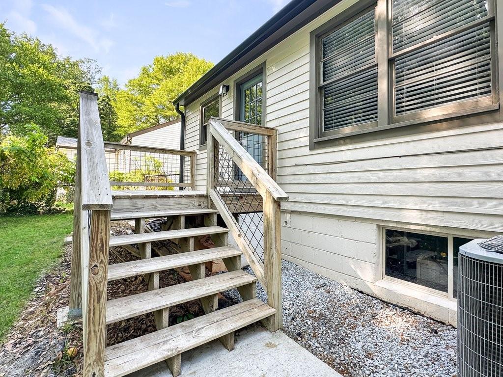 2350 Old Spring Road Smyrna, GA 30080 - Photo 20 of 26 a view of a house with backyard and deck