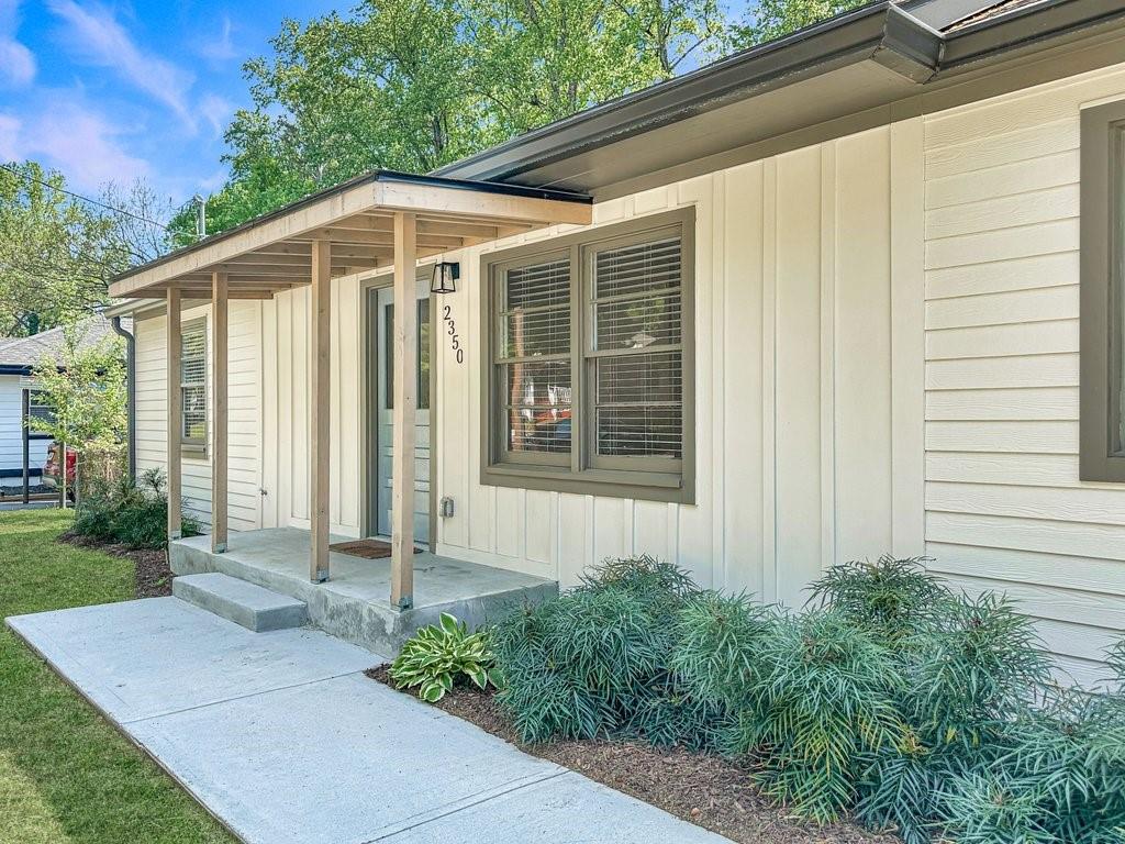2350 Old Spring Road Smyrna, GA 30080 - Photo 4 of 26 a front view of a house with garden