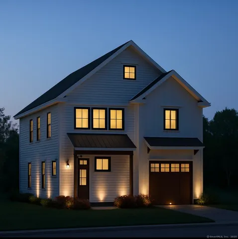 a front view of a house with yard and parking