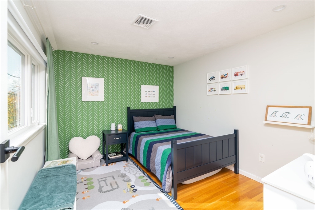 255 Elm Street Marshfield, MA 02050 - Photo 22 of 42 a bedroom with a bed and a windows