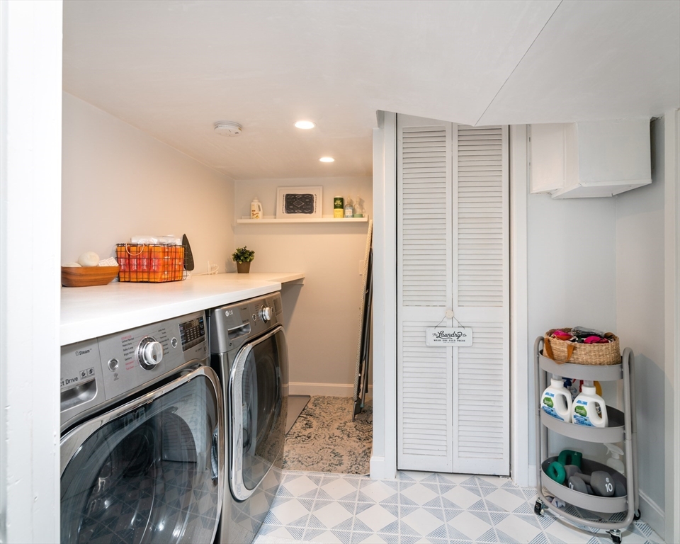 255 Elm Street Marshfield, MA 02050 - Photo 29 of 42 a utility room with sink dryer and washer