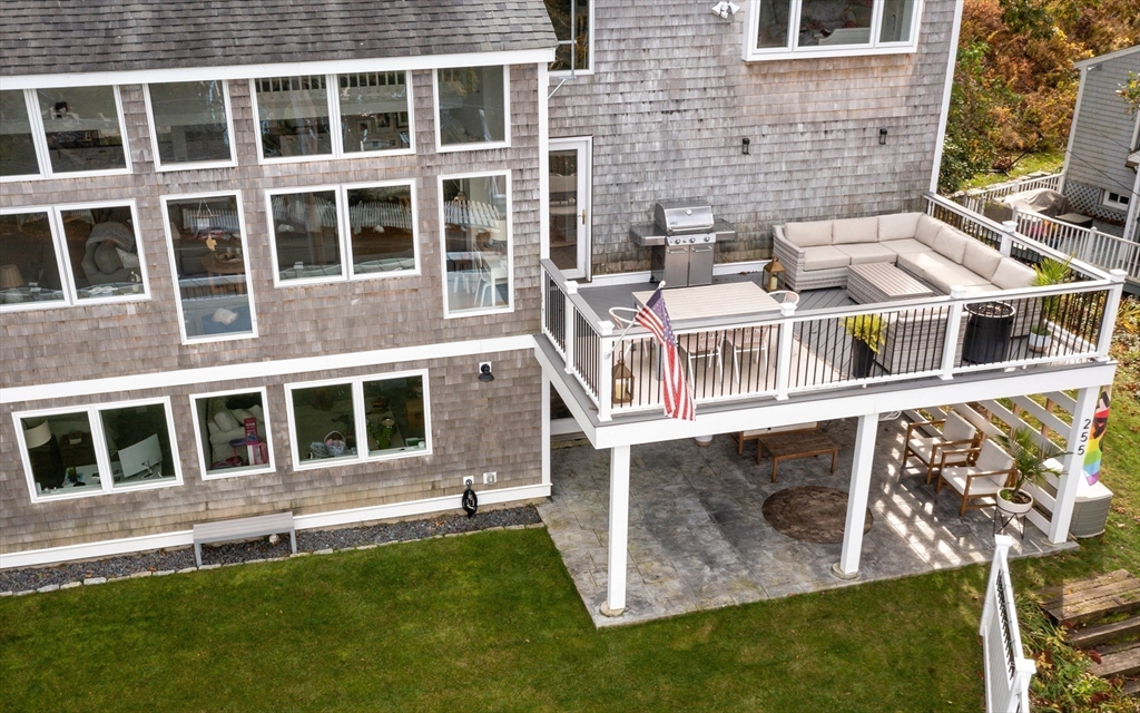 255 Elm Street Marshfield, MA 02050 - Photo 34 of 42 a balcony with table and chairs