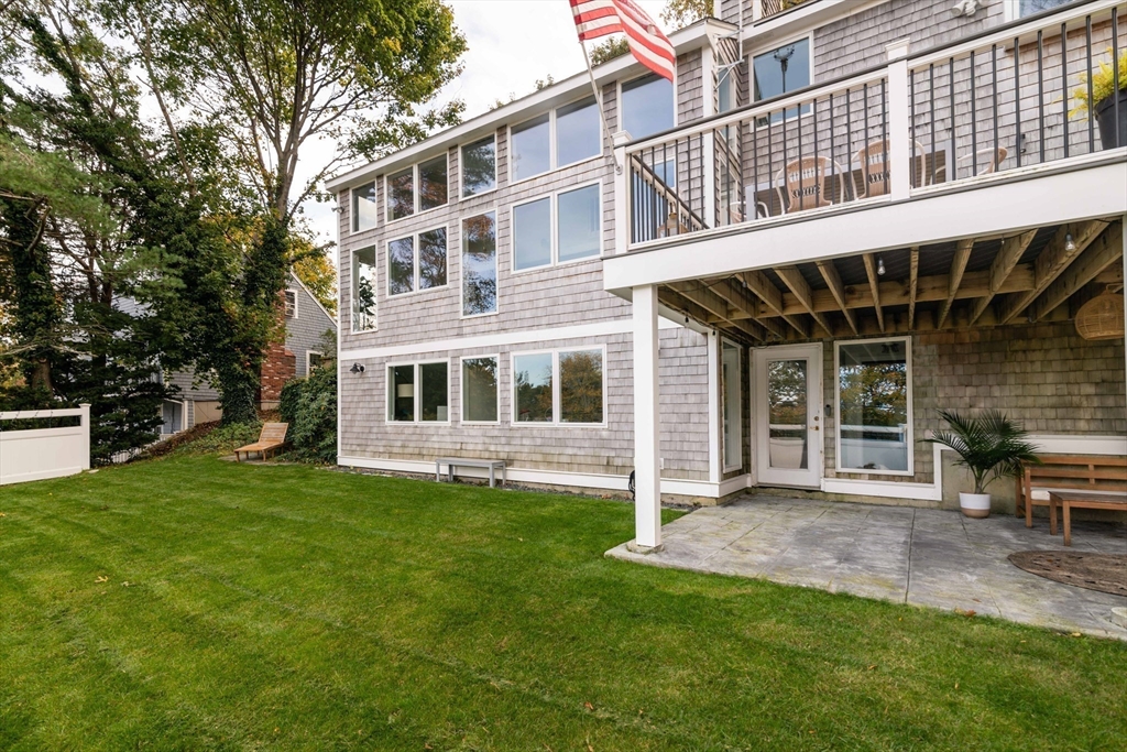 255 Elm Street Marshfield, MA 02050 - Photo 35 of 42 a front view of a house with a garden