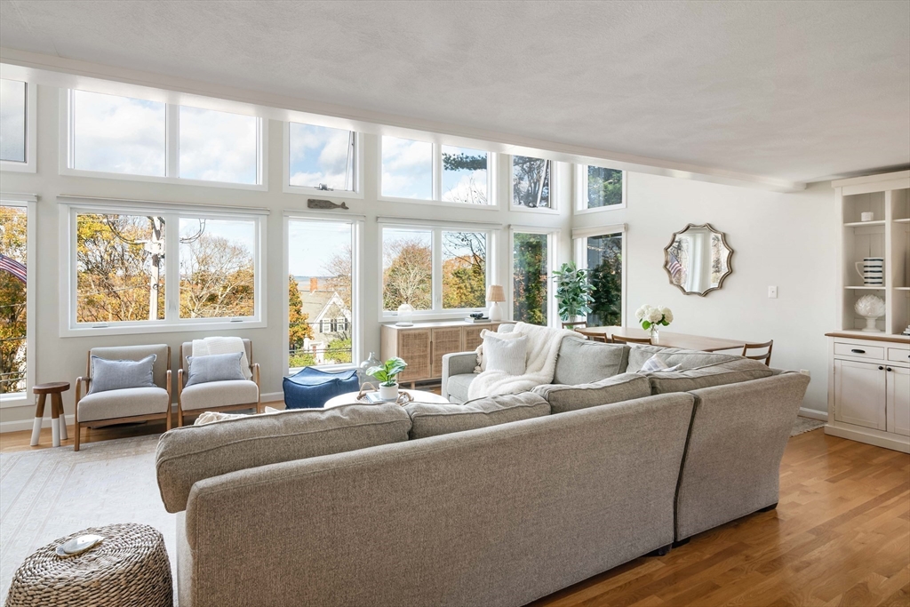 255 Elm Street Marshfield, MA 02050 - Photo 7 of 42 a living room with furniture and large windows