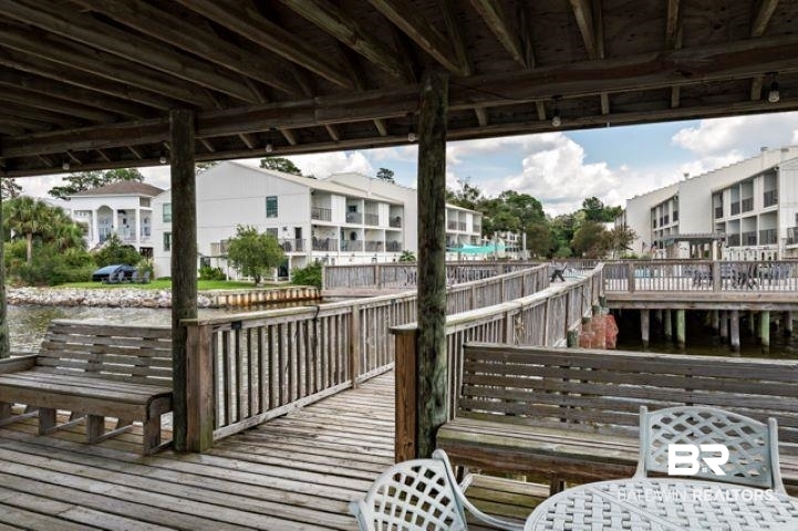 710 South Mobile Street, Unit 52 Fairhope, AL 36532 - Photo 37 of 58 Dock with a deck