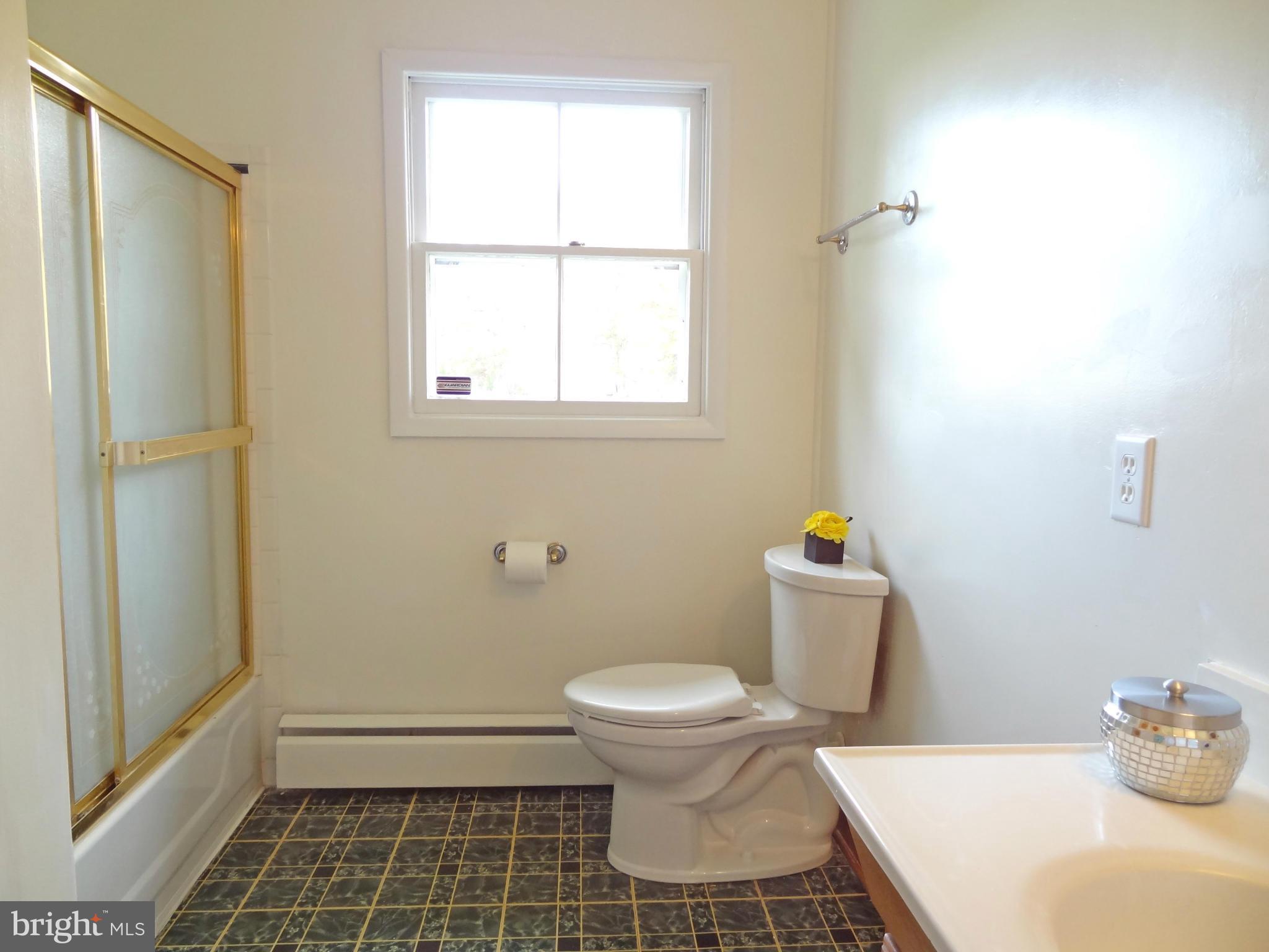 4878 Dumfries Road Catlett, VA 20119 - Photo 20 of 30 a bathroom with a toilet and a shower