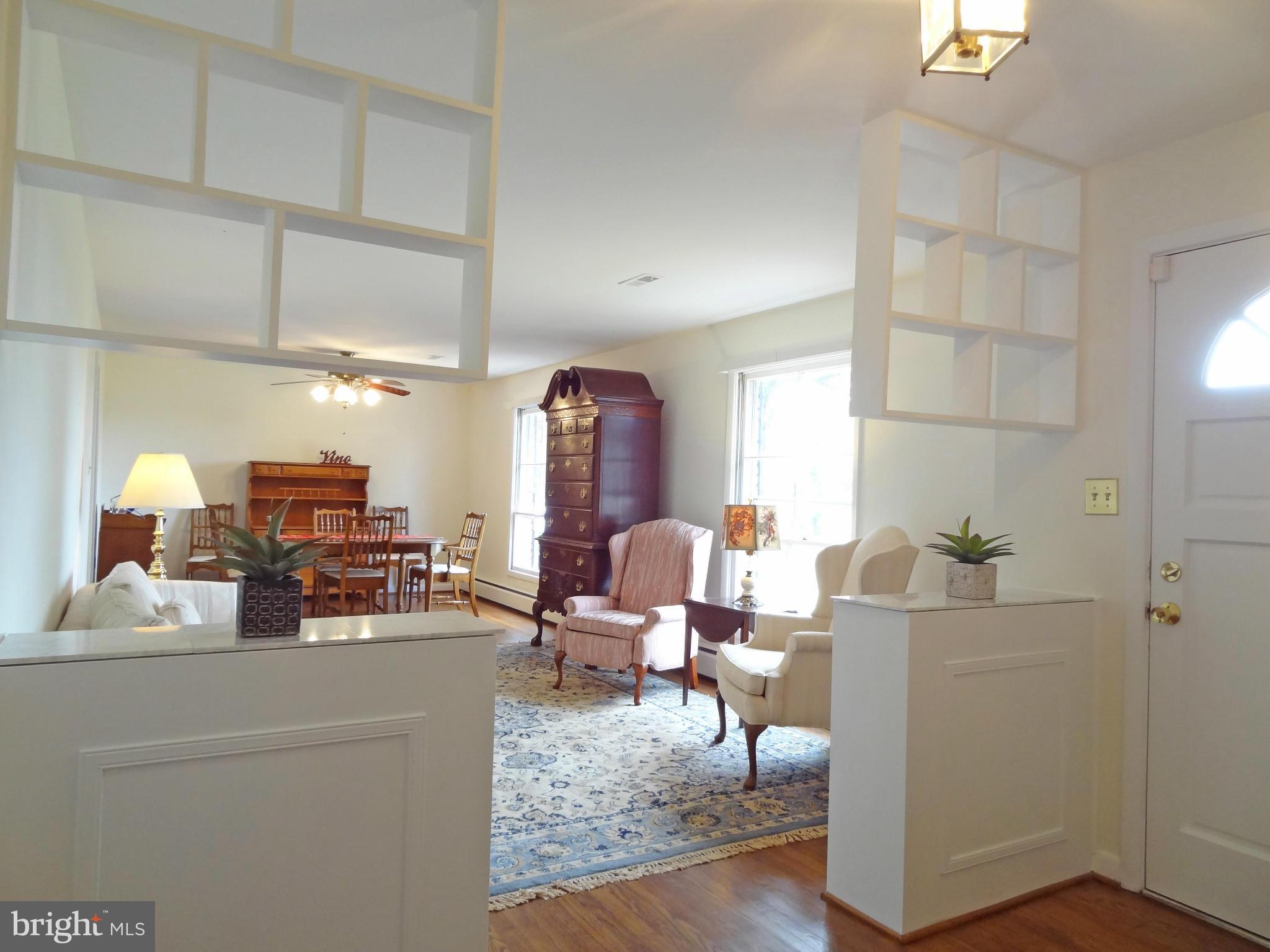 4878 Dumfries Road Catlett, VA 20119 - Photo 3 of 30 a living room with furniture and wooden floor