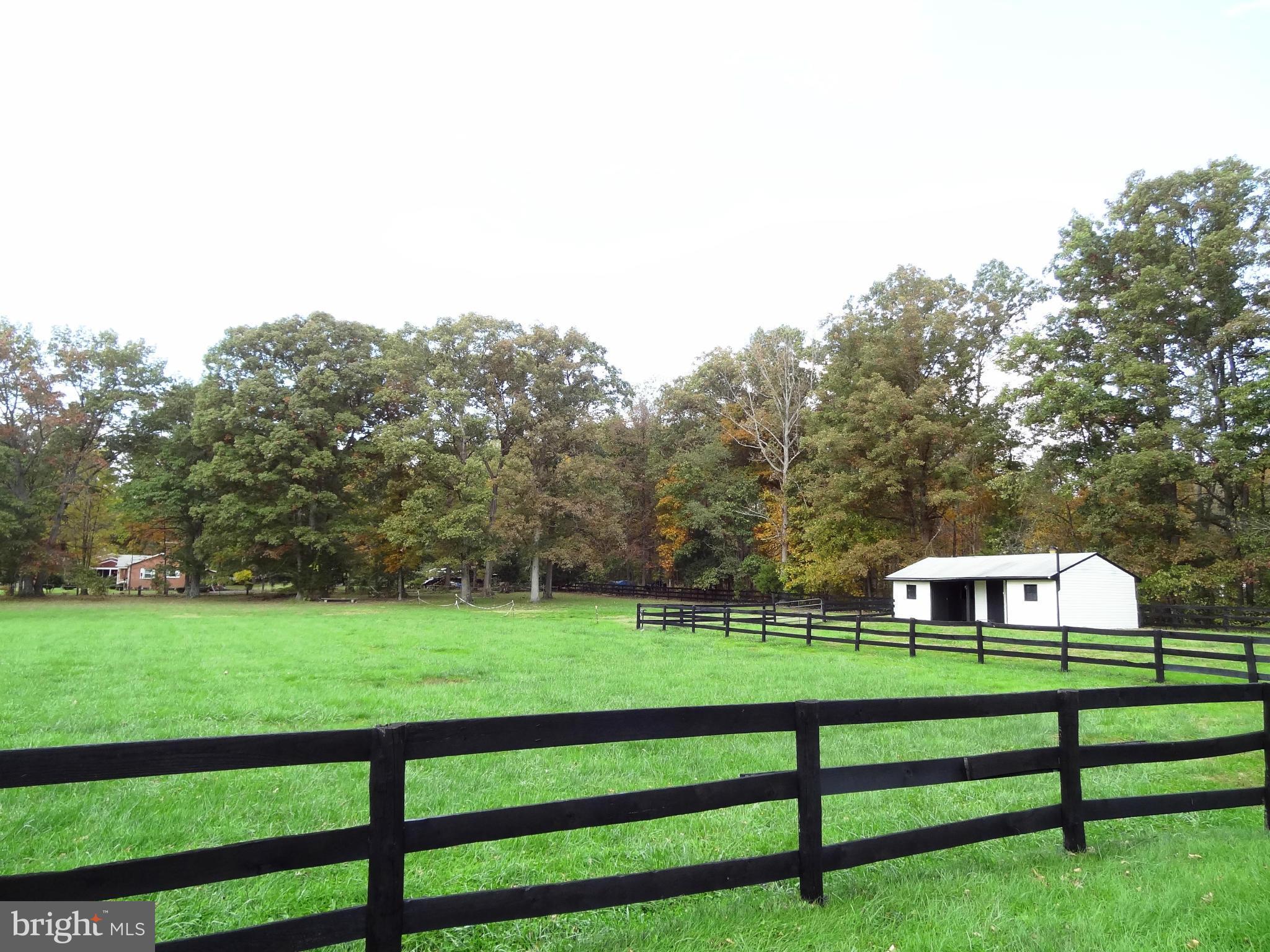 4878 Dumfries Road Catlett, VA 20119 - Photo 26 of 30 a front view of a house with a yard