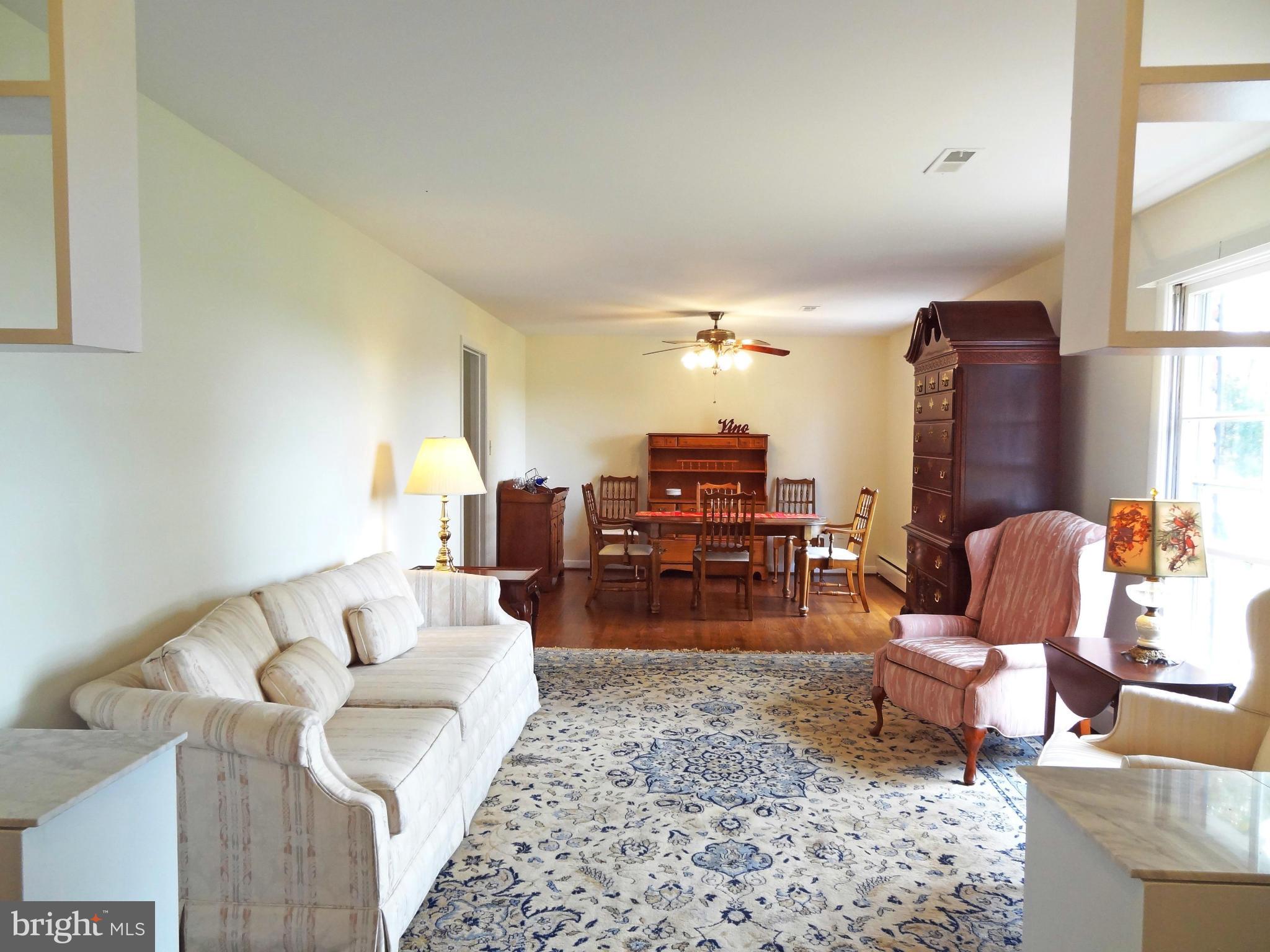 4878 Dumfries Road Catlett, VA 20119 - Photo 4 of 30 a living room with furniture and wooden floor