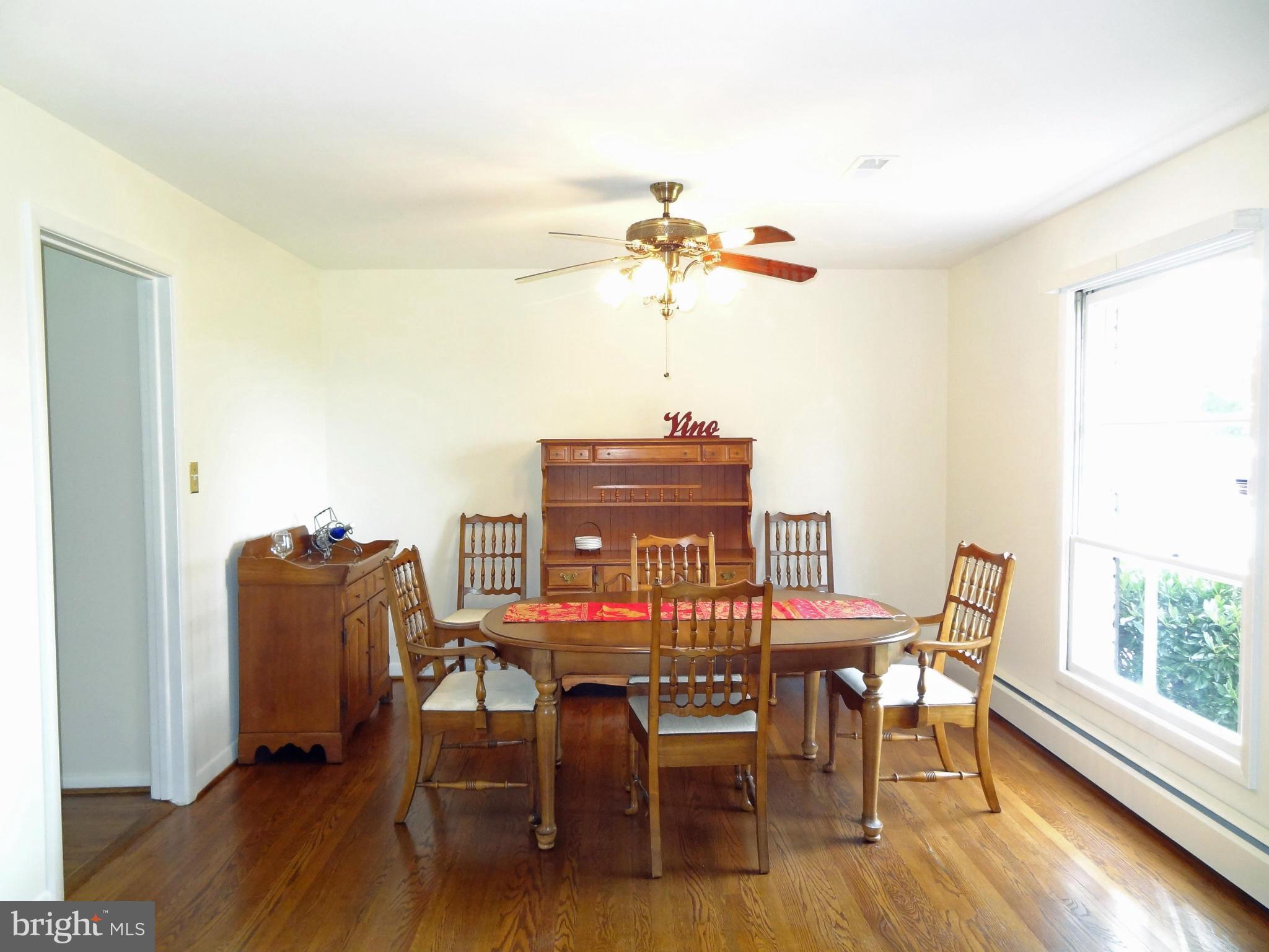 4878 Dumfries Road Catlett, VA 20119 - Photo 6 of 30 a view of a dining room with furniture window and wooden floor