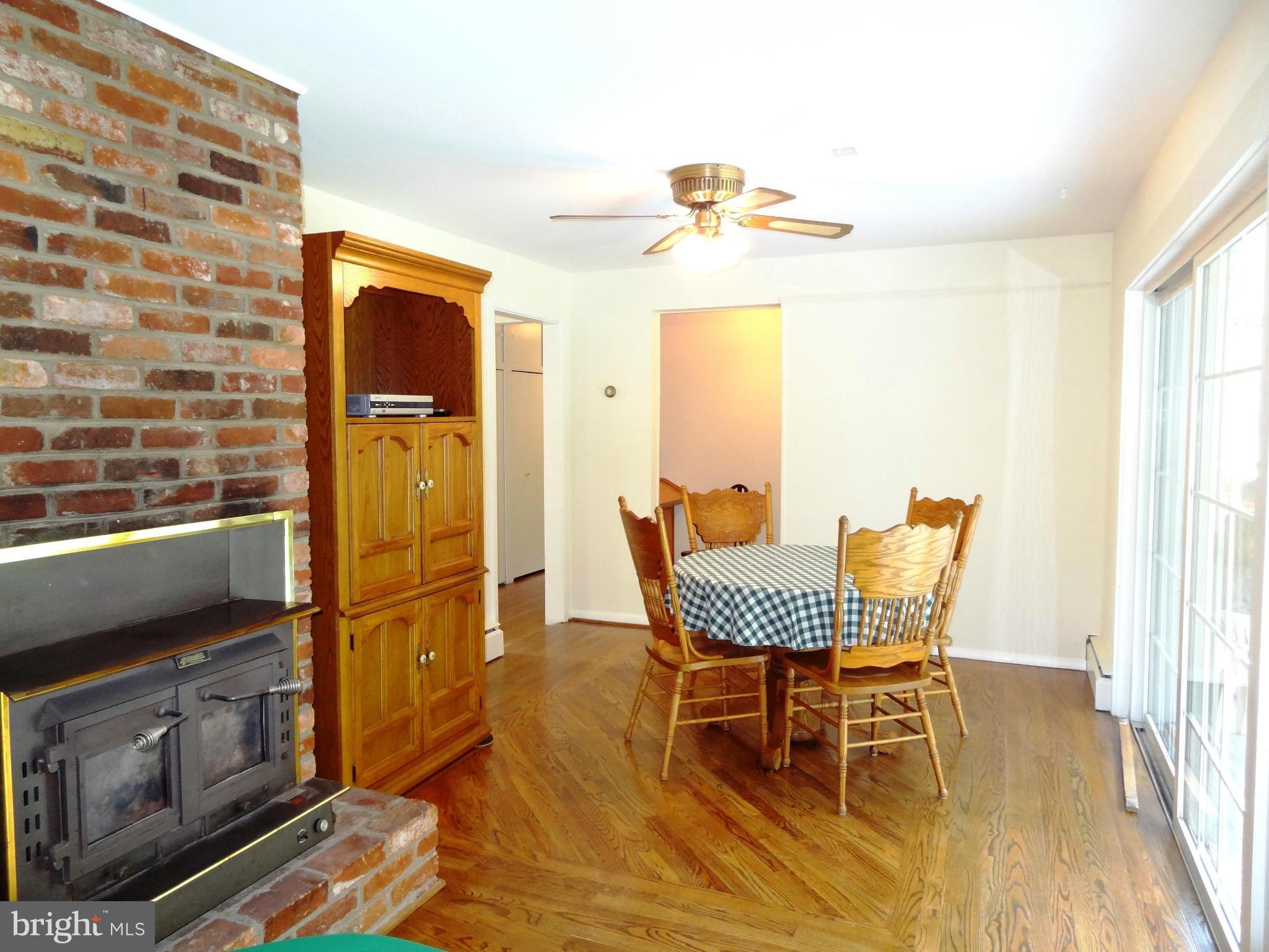 4878 Dumfries Road Catlett, VA 20119 - Photo 10 of 30 a dining room with furniture and wooden floor