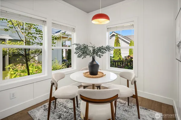 a view of a dining room with furniture window and outside view