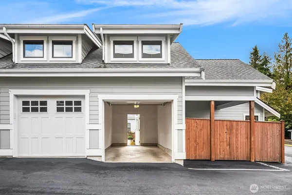a front view of a house with a garage
