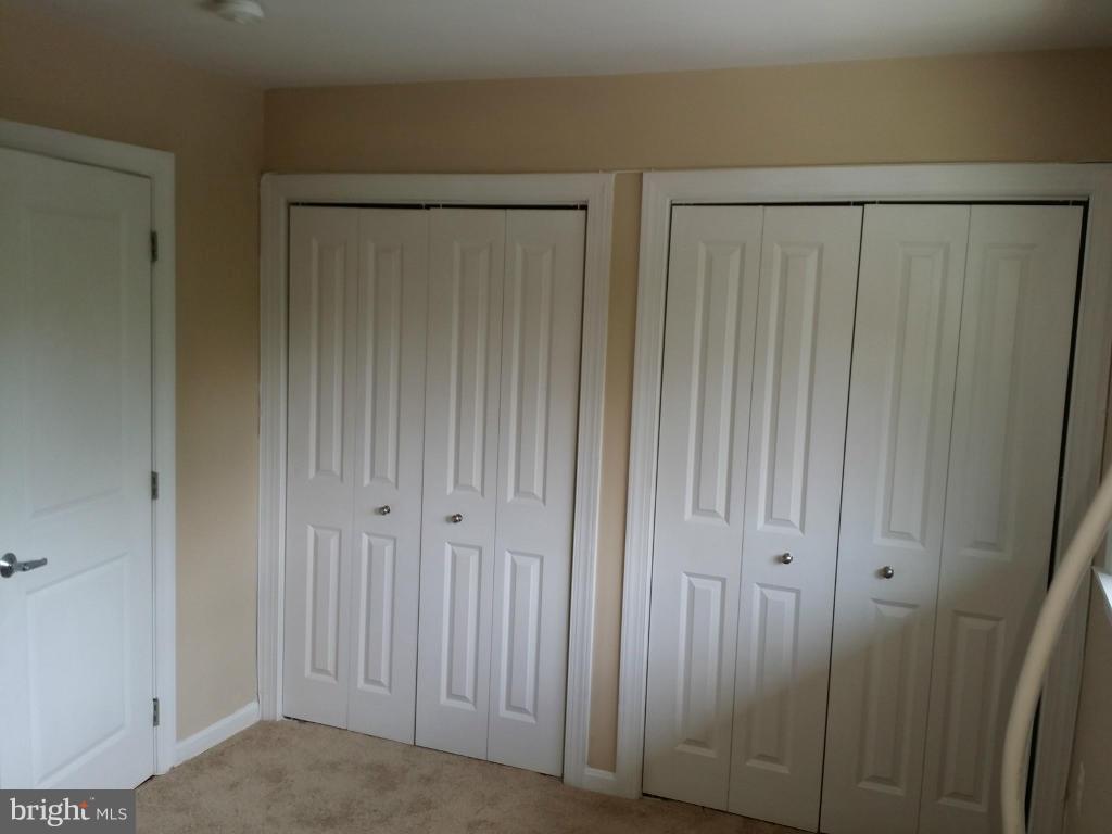 3105 Naylor Road Southeast, Unit 303 Washington, DC 20020 - Photo 10 of 10 a view of a hallway
