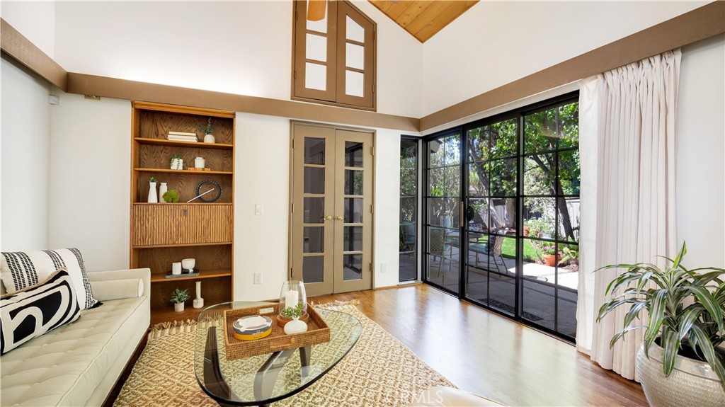 65 Pinewood, Unit 33 Irvine, CA 92604 - Photo 14 of 41 Real hardwood floors!- there are 3 sets of sliding glass doors with garden views!