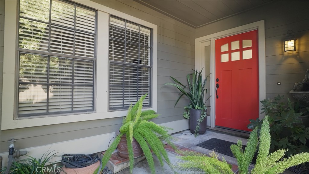 65 Pinewood, Unit 33 Irvine, CA 92604 - Photo 3 of 41 Entry with sharp custom red door and landscaped landing