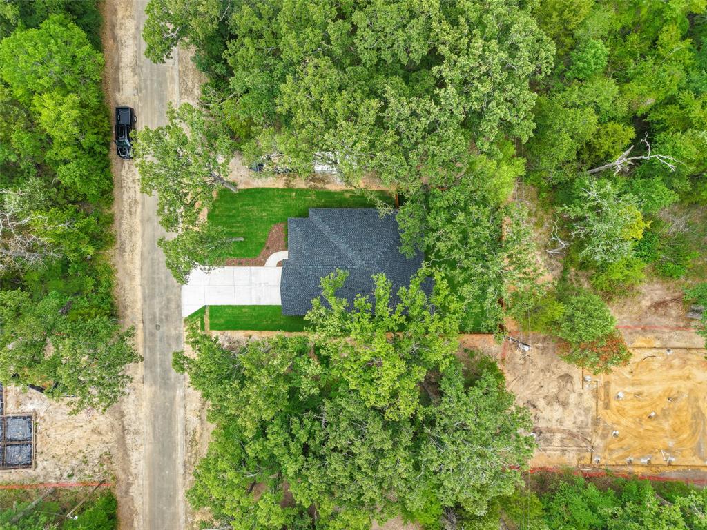 122 East Beachwood Loop Trinidad, TX 75163 - Photo 35 of 35 Aerial perspective showcasing a property surrounded by mature trees