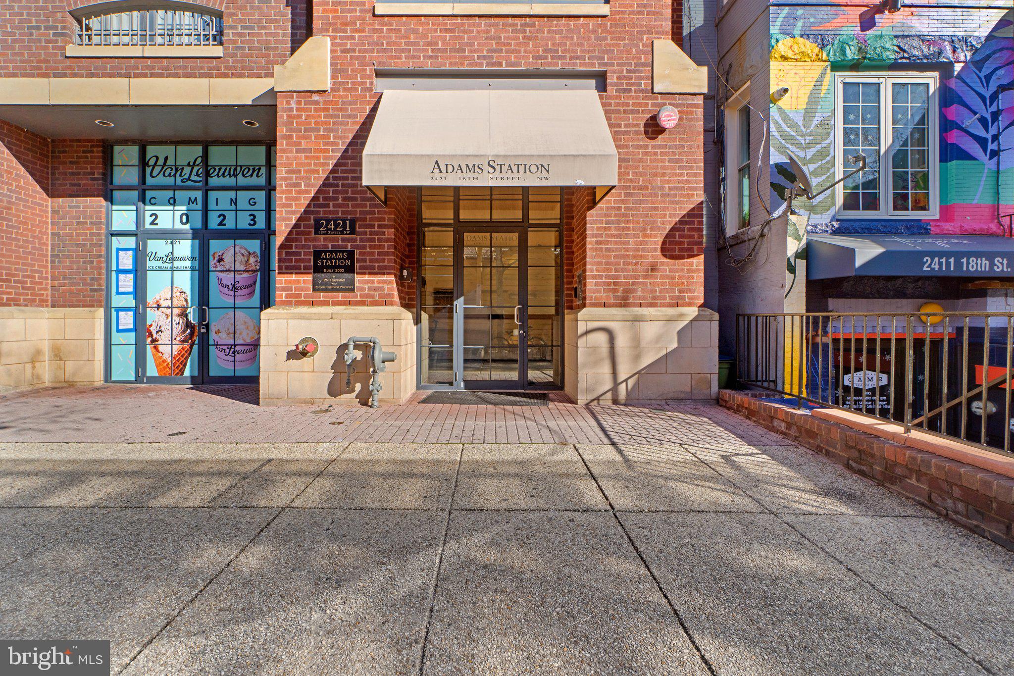 2421 18th Street Northwest, Unit 301 Washington, DC 20009 - Photo 1 of 35 a view of a house with large windows