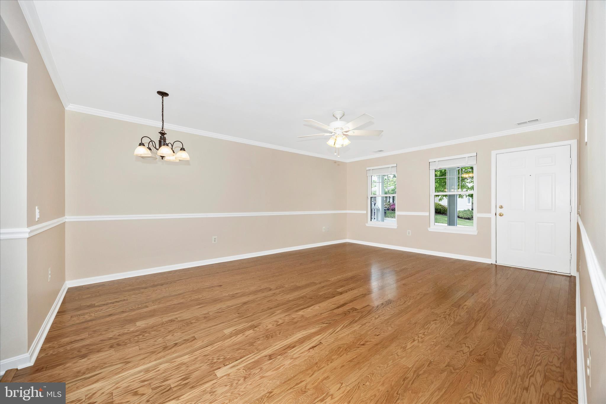 1007 Parade Lane Mount Airy, MD 21771 - Photo 15 of 55 wooden floor in an empty room with a window
