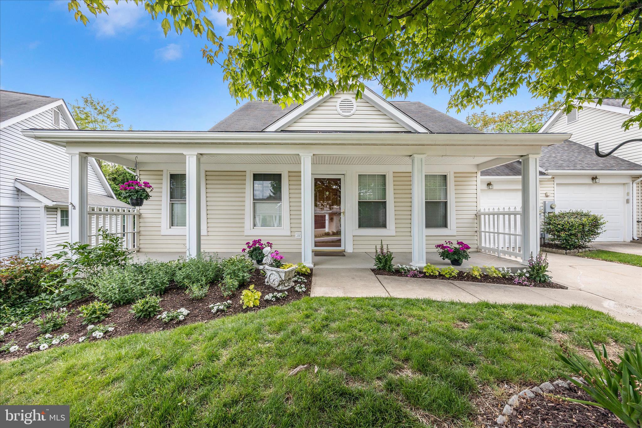 1007 Parade Lane Mount Airy, MD 21771 - Photo 3 of 55 a front view of a house with garden