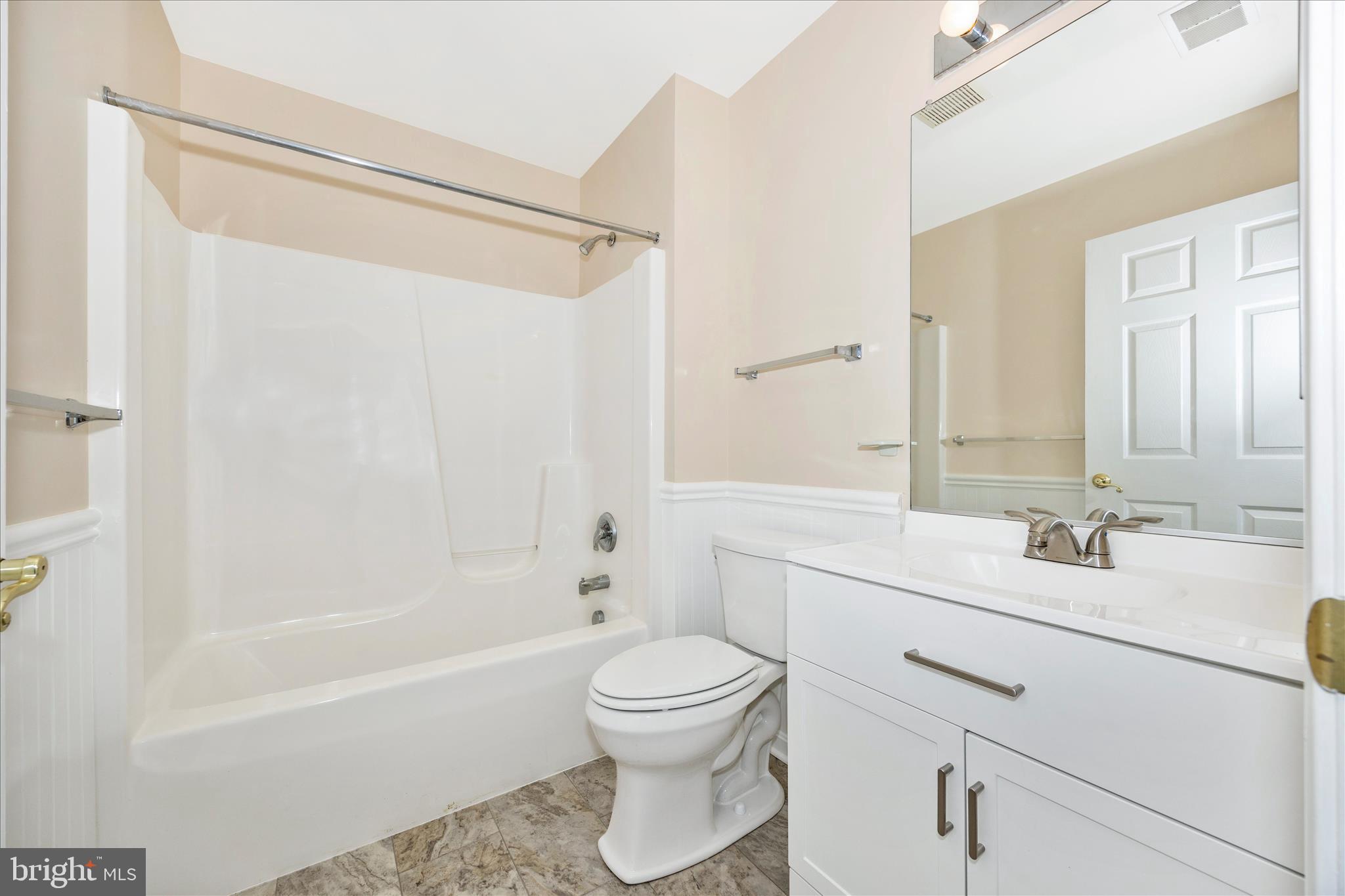 1007 Parade Lane Mount Airy, MD 21771 - Photo 36 of 55 a bathroom with a sink a toilet and shower