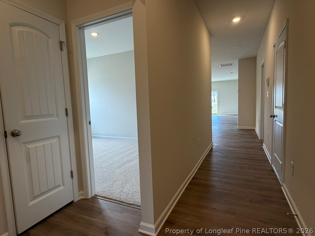 5409 Short Leaf Road Fayetteville, NC 28311 - Photo 3 of 40 a view of a hallway with the wooden floor