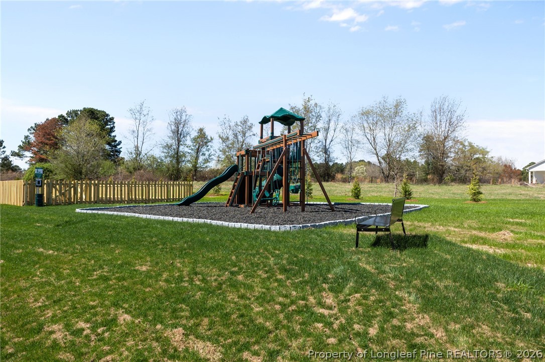 5409 Short Leaf Road Fayetteville, NC 28311 - Photo 34 of 40 a view of a park with swings and slides