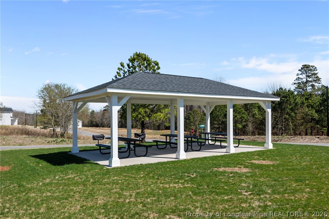 5409 Short Leaf Road Fayetteville, NC 28311 - Photo 36 of 40 a view of a house with backyard and porch