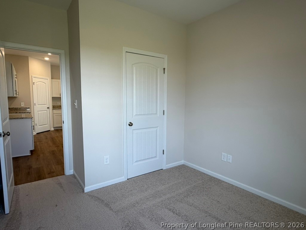 5409 Short Leaf Road Fayetteville, NC 28311 - Photo 10 of 40 a view of a room with wooden floor